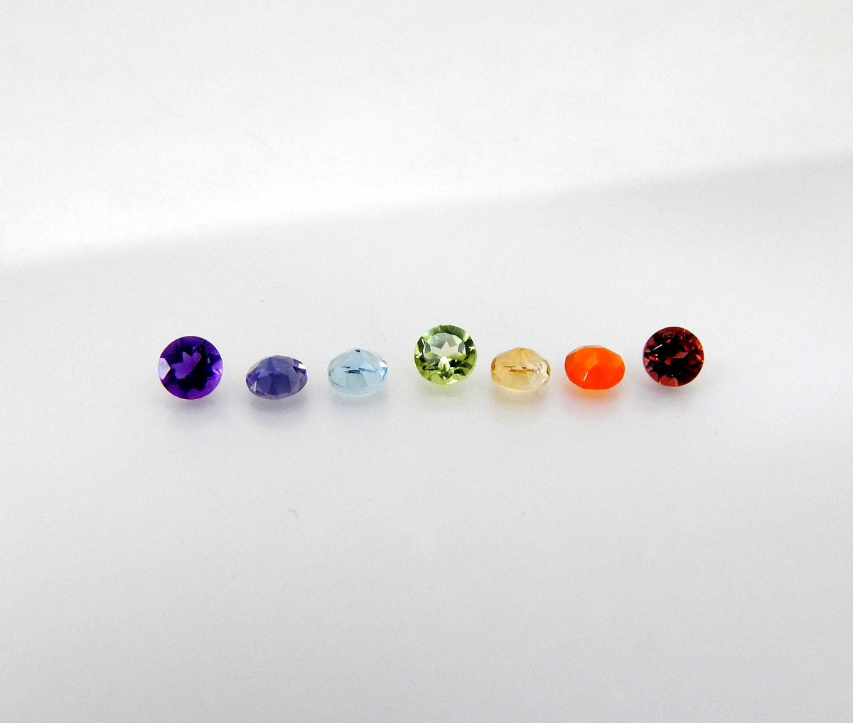 Myhealingworld Natural Amethyst Iolite Blue Topaz Peridot Citrine Carnelian and Garnet 3mm round faceted brilliant cut 7 chakra AAA quality loose calibrated gemstones for jewelry making (BOX 1 - (Round 3mm = 7 Stones)