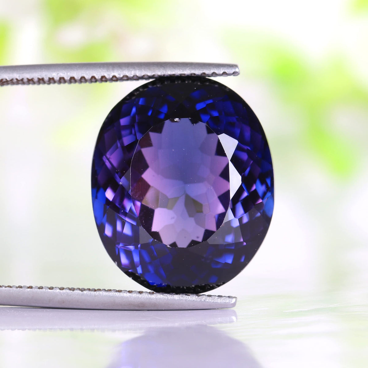 REAL-GEMS - Large Dark Blue Tanzanite 30. Carat Emerald Cut Gemstone For Ring & Pendant