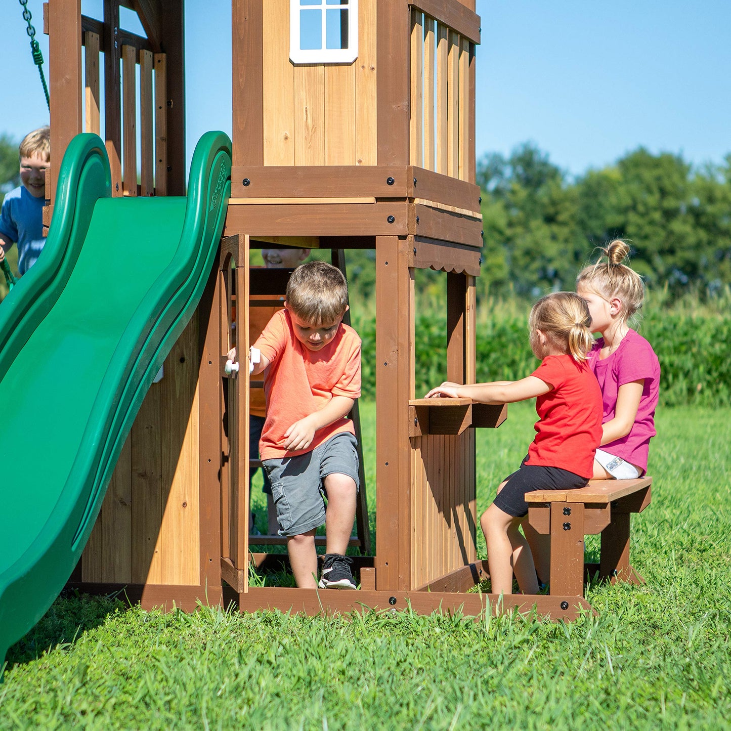 Backyard Discovery Lakewood Cedar Wood Swing Set with Wave Slide, Clubhouse, Playhouse, Snack Bar Window, Picnic Area, Belt Swings, Trapeze, Full Front Door, Windows, Step Ladder, Outdoor Playset